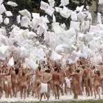 Naked volunteers battle with pillows as they pose for U.S. artist Spencer Tunick in front of the Gaasbeek's Castle, July 9, 2011. Organisers estimated 800 people posed for the early morning nude photo installation titled "Sleeping Beauties". REUTERS/Thierry Roge   (BELGIUM – Tags: SOCIETY) FOR EDITORIAL USE ONLY. NOT FOR SALE FOR MARKETING OR ADVERTISING CAMPAIGNS. TEMPLATE OUT – RTR2ONLS